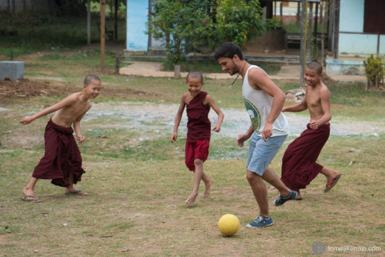 Julien playing with monk children, Old Bagain, Hsipaw, Myanmar