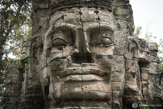 Close-up of one of the heads of Angkor Thom West Gate, Siem Reap, Cambodia