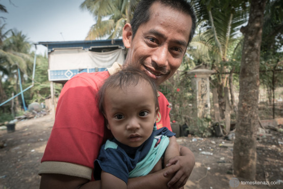Tuk-tuk driver and his youngest son, Battambang, Cambodia