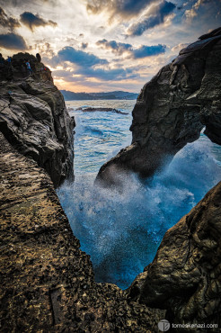 In the trail of a typhoon, waves are crashing strongly against the Elephant Trunk Rock, keelung, Taiwan.